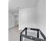 Neutral bedroom featuring white trim and doors, and a crib at 600 Tudor St, Kingston, GA 30145