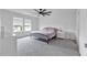 Bright bedroom with carpet, natural light, and ceiling fan at 600 Tudor St, Kingston, GA 30145