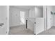 Upstairs hallway with access to bedrooms and bathrooms at 600 Tudor St, Kingston, GA 30145