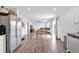 Open-concept kitchen with dining area and living room at 600 Tudor St, Kingston, GA 30145