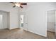 Bedroom with neutral carpet has en suite bathroom and walk-in closet at 1536 Liberty Nw Pkwy, Atlanta, GA 30318
