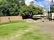 Dog park featuring mature shade tree with grassy areas surrounded by fencing at 1536 Liberty Nw Pkwy, Atlanta, GA 30318
