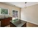 Charming kitchen with a dining area and sliding glass doors to a private patio at 1536 Liberty Nw Pkwy, Atlanta, GA 30318