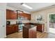 Well-appointed kitchen with granite counters, stainless steel appliances and a central island for food preparation at 1536 Liberty Nw Pkwy, Atlanta, GA 30318
