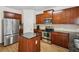 Bright kitchen with stainless steel appliances, center island, granite countertops and plenty of cabinet space at 1536 Liberty Nw Pkwy, Atlanta, GA 30318