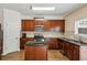 Charming kitchen with granite countertops, stainless steel appliances, and ample cabinet space for storage at 1536 Liberty Nw Pkwy, Atlanta, GA 30318