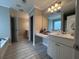 Bathroom featuring tiled floors, double vanity, and plenty of counter space at 17 Kola Ln, Rydal, GA 30171
