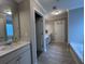 Bathroom featuring tiled floors, double vanity, and plenty of counter space at 17 Kola Ln, Rydal, GA 30171