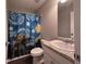Bathroom with a granite countertop, large mirror, and unique Starry Night themed shower curtain at 17 Kola Ln, Rydal, GA 30171