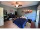 This bedroom features a ceiling fan, natural light and a gaming setup at 17 Kola Ln, Rydal, GA 30171