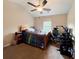 This bedroom features a ceiling fan, natural light, and dedicated gaming area at 17 Kola Ln, Rydal, GA 30171