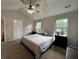 Bedroom featuring vaulted ceiling, ceiling fan, and large windows with natural lighting at 17 Kola Ln, Rydal, GA 30171