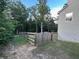 The fenced yard backs up to a wooded area at 17 Kola Ln, Rydal, GA 30171