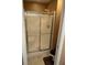 Bathroom featuring a shower with glass doors and neutral flooring at 2191 Rockbridge Road # 2603, Stone Mountain, GA 30087