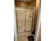 Clean bathroom features shower with glass doors and simple design at 2191 Rockbridge Road # 2603, Stone Mountain, GA 30087