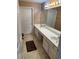 Bathroom with double sinks, long countertop, and neutral tones at 2191 Rockbridge Road # 2603, Stone Mountain, GA 30087