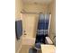 Bathroom with shower/tub combination and blue accents, ready for relaxation at 2191 Rockbridge Road # 2603, Stone Mountain, GA 30087