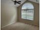 Cozy bedroom with large window and neutral carpet at 2191 Rockbridge Road # 2603, Stone Mountain, GA 30087