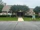 Beautiful community clubhouse with lush lawns and well-maintained landscaping at 2191 Rockbridge Road # 2603, Stone Mountain, GA 30087