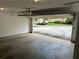 Spacious two-car garage with an automatic door opener and a view of the neighborhood at 2191 Rockbridge Road # 2603, Stone Mountain, GA 30087