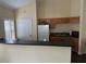 Functional kitchen with oak cabinets, stainless steel appliances, and ample counter space at 2191 Rockbridge Road # 2603, Stone Mountain, GA 30087