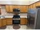 Functional kitchen featuring stainless steel appliances and ample cabinet storage at 2191 Rockbridge Road # 2603, Stone Mountain, GA 30087