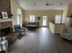 Spacious living area with a stone fireplace and bar seating at 2191 Rockbridge Road # 2603, Stone Mountain, GA 30087
