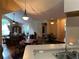 Bright open-concept living room connected to dining area with natural light and neutral tones at 2191 Rockbridge Road # 2603, Stone Mountain, GA 30087