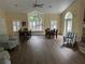Brightly lit community lounge area with vaulted ceiling, fireplace, and lots of seating at 2191 Rockbridge Road # 2603, Stone Mountain, GA 30087