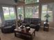 Cozy sunroom featuring comfortable seating, large windows, and a warm ambiance at 2191 Rockbridge Road # 2603, Stone Mountain, GA 30087