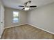 Cozy bedroom with natural light, carpet floors, and a soothing ambiance at 2478 Wood Meadows Sw Dr, Marietta, GA 30064