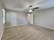 Large main bedroom featuring a ceiling fan, carpet floors, and natural light at 2478 Wood Meadows Sw Dr, Marietta, GA 30064