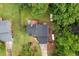 Aerial view of the property showcasing the layout and surrounding landscape with a patio at 252 Parkway Ct, Dallas, GA 30157