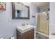 Cozy bathroom with updated vanity, square mirror, and enclosed shower at 252 Parkway Ct, Dallas, GA 30157
