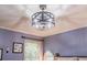 Bedroom ceiling light fixture with a decorative ceiling fan and a window at 252 Parkway Ct, Dallas, GA 30157