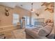 Bonus room with a couch, animal head decor and partial refrigerator at 252 Parkway Ct, Dallas, GA 30157