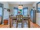Bright dining area featuring a bay window, stylish table, and modern decor at 252 Parkway Ct, Dallas, GA 30157