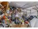 Cluttered garage filled with tools, equipment, and storage, showing ample space at 252 Parkway Ct, Dallas, GA 30157