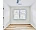 Bright bedroom with light hardwood floors and two windows with neighborhood views at 2502 Tupelo Se St, Atlanta, GA 30317
