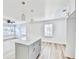 Bright, open kitchen featuring a center island, modern pendant lighting, and stainless steel appliances at 2502 Tupelo Se St, Atlanta, GA 30317