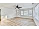 Spacious living room with ceiling fan, new floors and window at 2502 Tupelo Se St, Atlanta, GA 30317