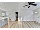 Open-concept living area featuring a view of the kitchen with island at 2502 Tupelo Se St, Atlanta, GA 30317