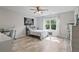 Bedroom with a bed, desk, and window providing natural light and a view at 31 Thunderhawk Ne Ln, Rydal, GA 30171