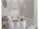 A large foyer features a tall ceiling and an arched entryway at 31 Thunderhawk Ne Ln, Rydal, GA 30171