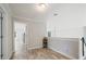 Hallway leading into two rooms featuring natural light at 31 Thunderhawk Ne Ln, Rydal, GA 30171