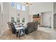 Inviting living room with a vaulted ceiling, fireplace, and large windows for natural light at 31 Thunderhawk Ne Ln, Rydal, GA 30171