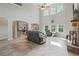 Spacious living room with vaulted ceiling, fireplace, open floor plan, and large windows at 31 Thunderhawk Ne Ln, Rydal, GA 30171
