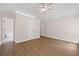Spacious main bedroom with ceiling fan and hardwood floors at 425 Greenmont Walk Ct, Alpharetta, GA 30009