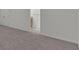 Cozy bedroom showcasing neutral carpet and attached bathroom at 4401 Belcamp Rd, Union City, GA 30213