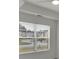 Bright bedroom with a large window offering a view of the neighborhood at 4401 Belcamp Rd, Union City, GA 30213
